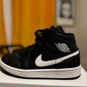 Nike Air Jordan Black and White High-Top Sneakers